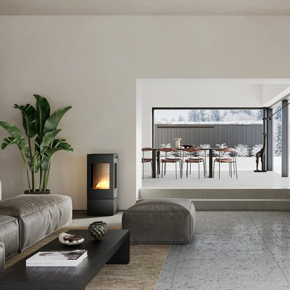 Bioethanol Kaminofen NEXO 100 BIO in der Farbe Schwarz im Wohnraum mit einem Sofa