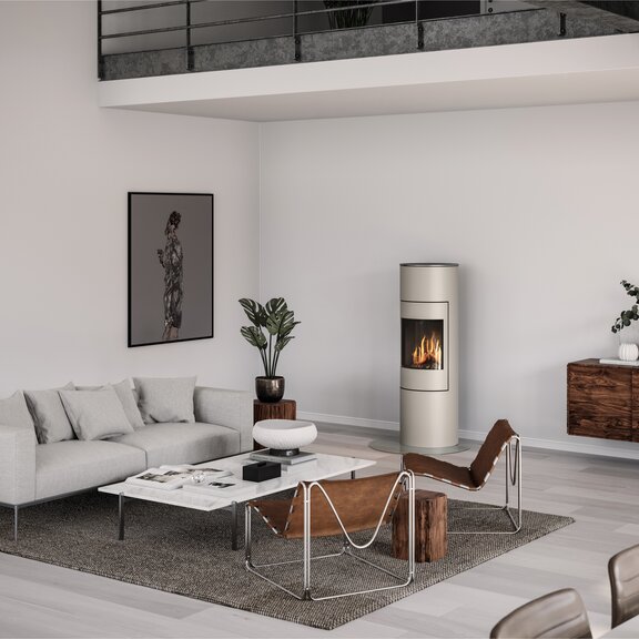 Gas-Kaminofen VIVA 140 L in Nickel mit Stahltür in stylischem Wohnzimmer mit grau-braunen Akzenten