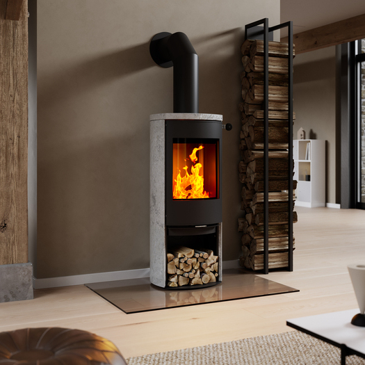 Stufa a legna CARO 120 con porta in acciaio di colore nero e rivestimento in pietra ollare
